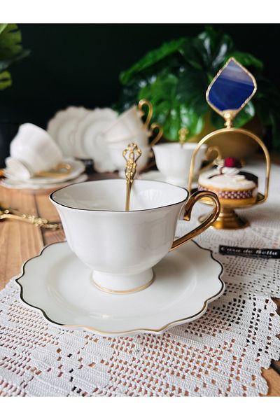 CASA DE BELLA كوب شاي صيني ذهبي اللون مكون من 6 أشخاص