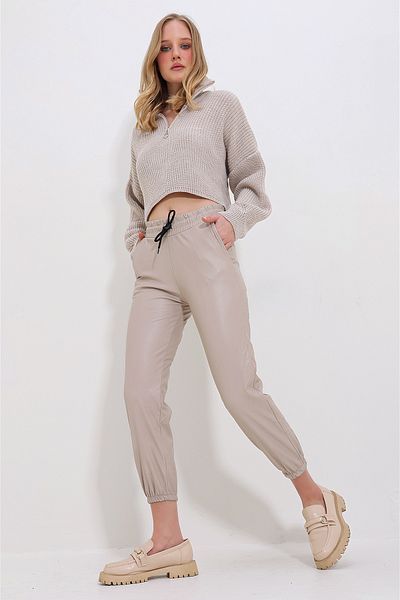 Trend Alaçatı Stili Women's Beige Double Pocket Waist and Wrist Elastic Casual Faux Leather Trousers ALC-X7329
