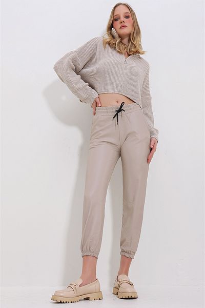 Trend Alaçatı Stili Women's Beige Double Pocket Waist and Wrist Elastic Casual Faux Leather Trousers ALC-X7329