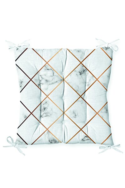 Realhomes وسادة كرسي منفوشة مزخرفة باللون الذهبي مع رسم رباعي على أرضية رخامية