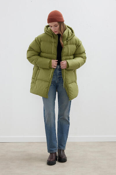 Manuka معطف منتفخ بأكمام قابلة للإزالة باللون الأخضر