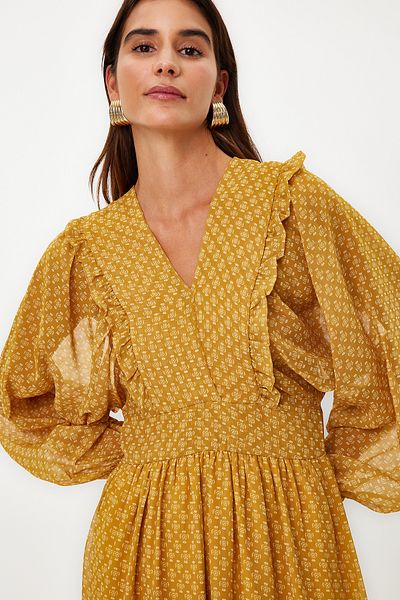 Trendyol Modest Senfgelbes, minimal gemustertes, mit Chiffon gefüttertes Webkleid TCTSS24EB00035