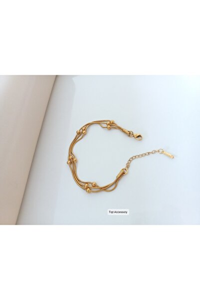 Tişt Accessory سوار نسائي ذهبي دوريكا مكون من 3 صفوف من الفولاذ المقاوم للتشويه