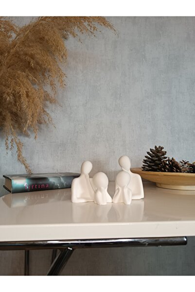 the hugging couple and the family with two children. White home decoration, inescapable.