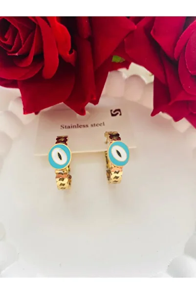 kara.shome STEEL EARRINGS EVIL EYE GOLD MODEL