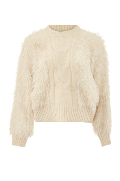Swirly knitted sweater