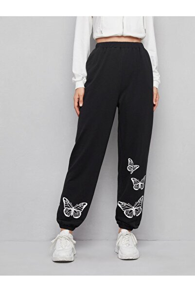 Drippy Pantaloni de jogger cu modele florale Unity