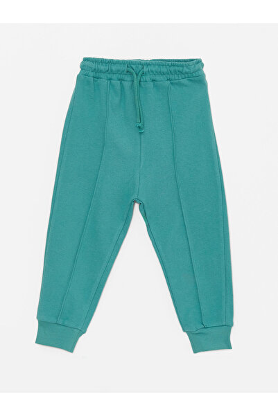 LC Waikiki Crew nyakú, hosszú ujjú Snoopy nyomott pulóver és kocogó nadrág szett 2 darabból