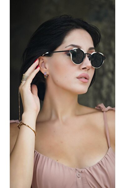 Angel Eyes نظارة شمسية نسائية بيضاوية بإطار كريمي باللون الأسود وزجاج أسود