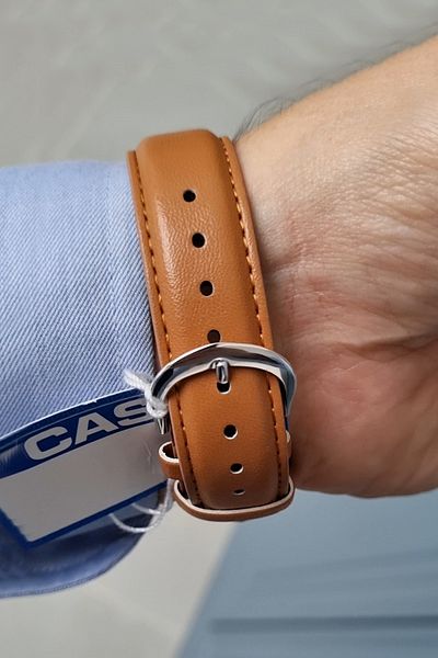 Casio Taba Leather Strap Navy Blue Dial Roman Number Men's Wristwatch
