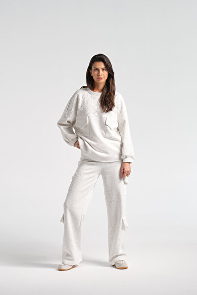 Nur OSKAY İrina, Eşortman Takım