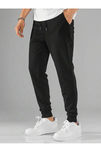 Khione Unisex μαύρο παντελόνι με ελαστικό πόδι