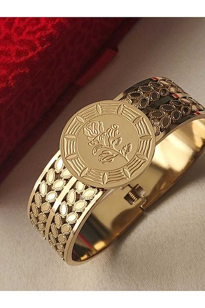 ZÜLİSCH STEEL THICK CLAMP FLOWER DETAIL STAINLESS GOLD