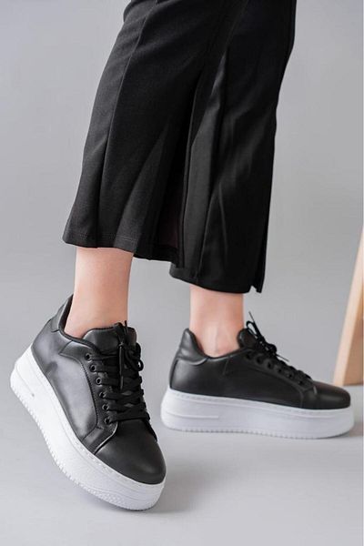 Butik Black lace-up white sole sneakers