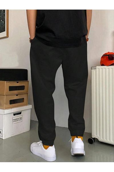Khione Unisex Μαύρο εμπριμέ ανυψωμένο παντελόνι με ελαστικό πόδι
