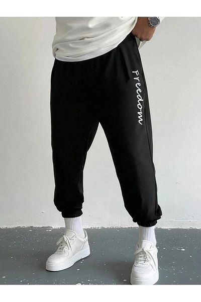 Khione Unisex μαύρο εμπριμέ ανυψωμένο παντελόνι με ελαστικό πόδι
