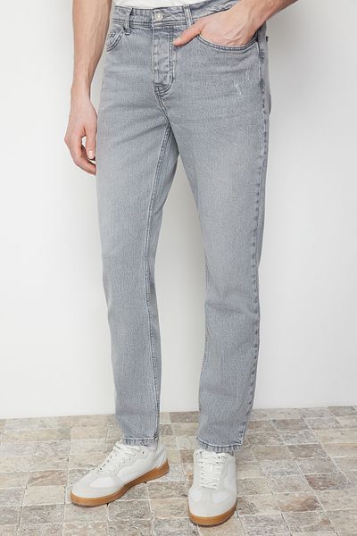 Trendyol Collection Graue Slim-Fit-Jeans-Jeans-Hose aus Stretch-Stoff mit schmaler Passform und Fransen TMNSS24JE00010