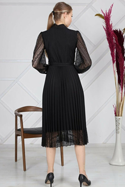 zks grup tekstil Černé večerní šaty s krajkovým detailem