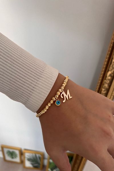 Trendy Butik Dorica Bracelet with Letter m and Evil Eye Hanging