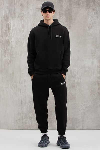 GRIMELANGE Weiche, elastische, schmale Herren-Jogginghose von Bernon mit drei Taschen aus Bio-Baumwolle in Schwarz