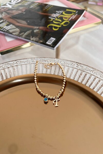 Trendy Butik T Harf ve Nazar Sallantılı Dorika Bileklik