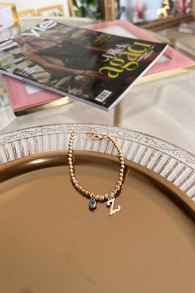 Trendy Butik سوار دوريكا مع حرف Z وعين الشر المتدلية