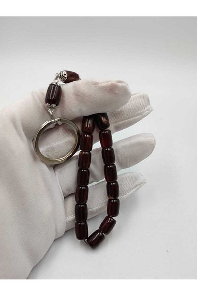 ALTUNTAŞ CHOCOLATE MORTARY CAPSULE CUT CRIMPED AMBER KEYCHAIN
