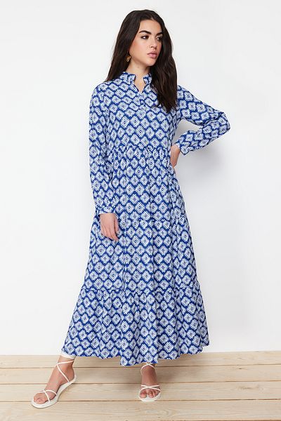 Trendyol Modest Saks-Gürtelrock, Volant, Blumenmuster, gefüttertes Webkleid TCTSS23EB00111