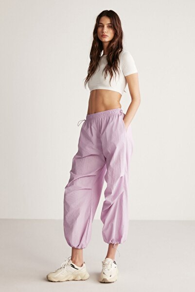 GRIMELANGE Kelsey Women's Waterproof Parachute Fabric Stopper Detailed Lilac Trousers