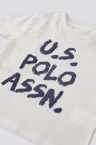 U.S. Polo Assn. مجموعة بيبي بوي كريمية مرخصة من يو اس بولو اسن