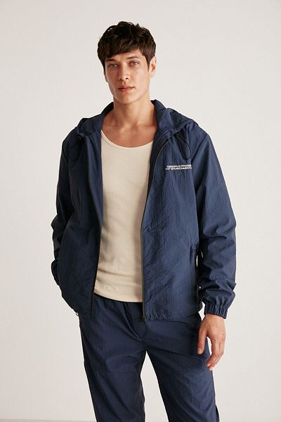 GRIMELANGE Anderson Men's Parachute Fabric, Water Repellent Lined, Pockets and Front Zippered Navy Blue Raincoat