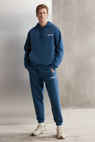 GRIMELANGE Weiche, elastische, schmale Herren-Jogginghose von Bernon mit drei Taschen aus Bio-Baumwolle in Blau