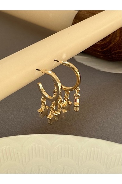 takıtarzım Gold yıldız sallantılı shakıra küpe