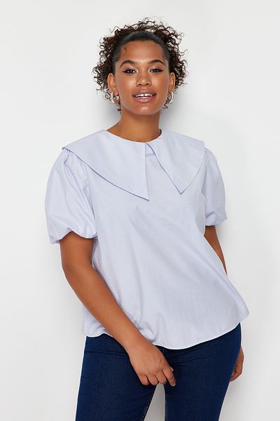 Trendyol Curve Hellblaue gewebte Bluse TBBSS24AF00000