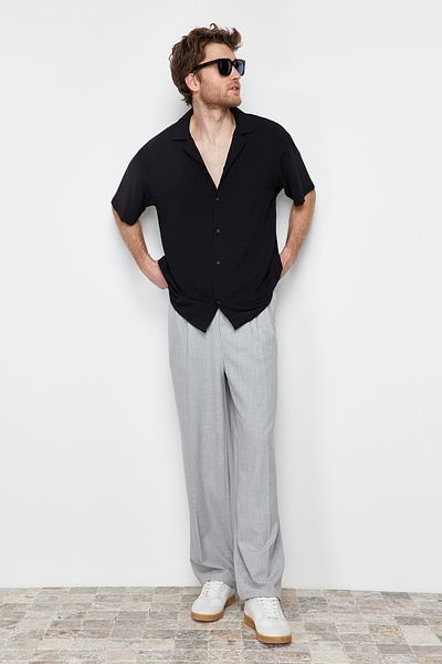 Trendyol Collection Letní oversize plátěná košile s krátkým rukávem – černá TMNSS24GO00019