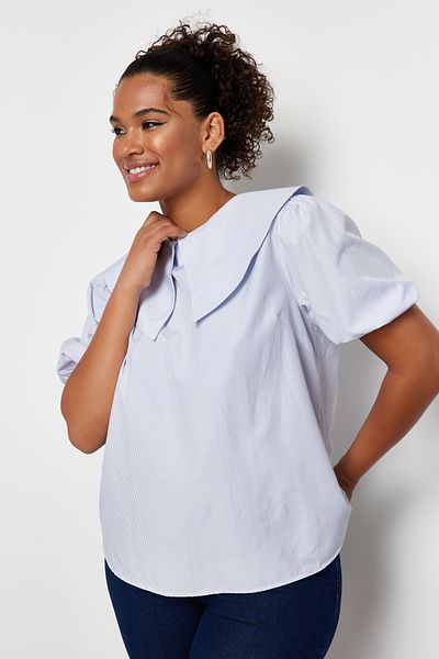 Trendyol Curve Hellblaue gewebte Bluse TBBSS24AF00000