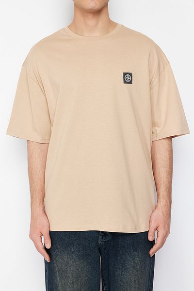 Trendyol Collection Béžové oversize tričko Tok Fabric Compass - 100% bavlna TMNSS24TS00111