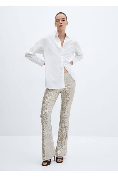 MANGO Woman Παντελόνι flare με παγιέτες