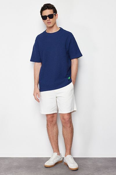 Trendyol Collection Navy Blue Textured Short Sleeve T-Shirt - Regular Fit TMNSS24TS00058