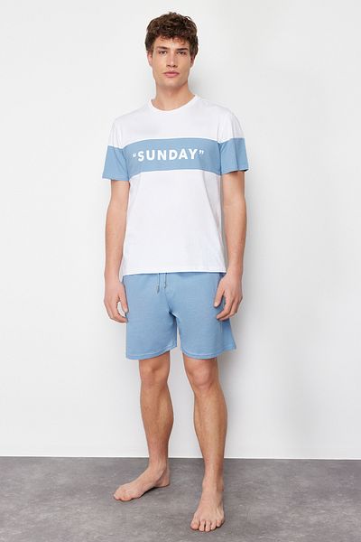 Trendyol Collection Blaues Pyjama-Set mit Slogan-Aufdruck in normaler Passform und gestrickten Shorts TMNSS24PT00002