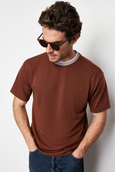 Trendyol Collection Περιορισμένης έκδοσης Καφέ υπερμεγέθη/φαρδιά πλεκτά μπλουζάκια πικέ με υφή TMNSS23TS00079