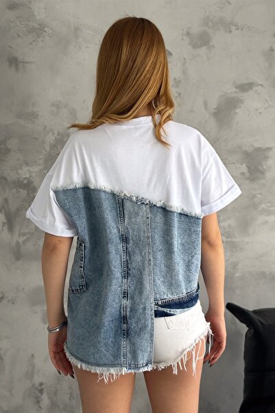 FEMELLE Dámské bílé tričko asymetrického střihu s detailním designem boční kapsy se střapcem