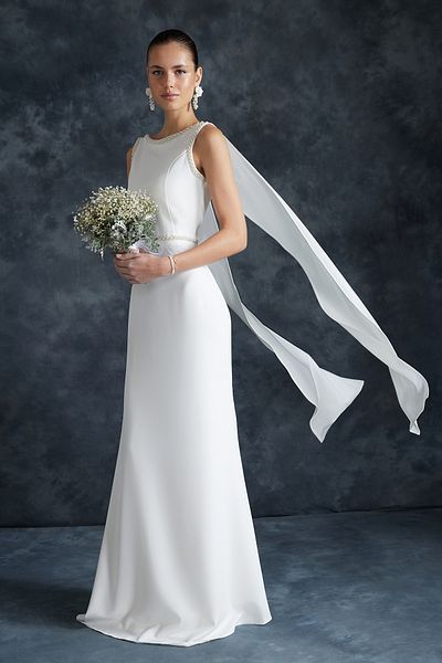 Trendyol Collection Λεπτομερές νυφικό και νυφικό μακρύ βραδινό φόρεμα με λευκό μαργαριτάρι - TPRSS24AE00043