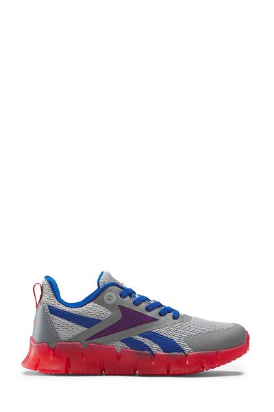 Reebok حذاء الجري ZIG N' GLOW المطاطي باللون الرمادي للأولاد