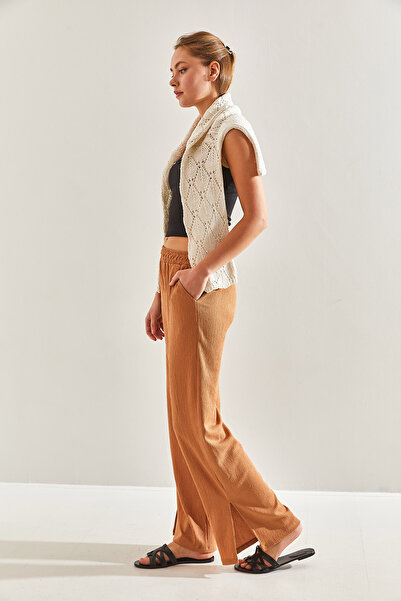 Bianco Lucci Dámské kalhoty s elastickým pasem Palazzo s bočním rozparkem60171010