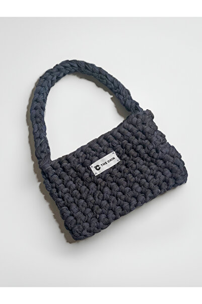 The Chin Denim-like knitted baguette bag