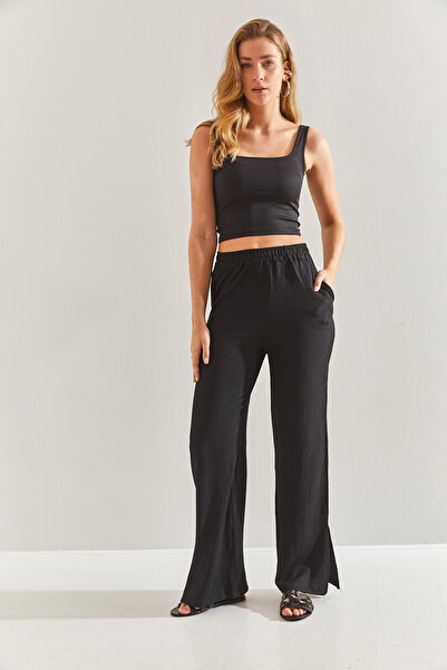 Bianco Lucci Dámské kalhoty s elastickým pasem Palazzo s bočním rozparkem60171010