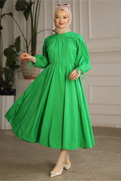 Gizce Leong Green Dress