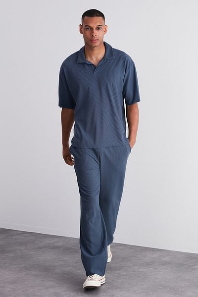 Trendyol Collection Indigo Limited Edition – Relaxed Fit Texturierte Jogginghose mit versteckter Spitze TMNSS23EA00013