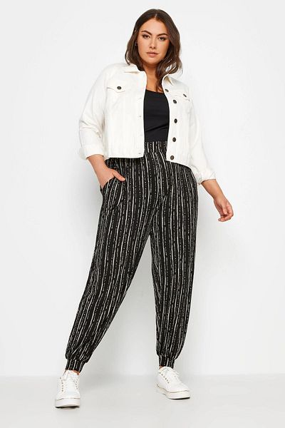 Stil Diva Pantaloni subțiri de mărime mare, cu buzunare, cu picioare și talie elastică 302587
